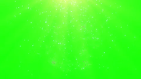 Glowing particles burst on green background with spotlight 스톡 동영상 337447944
