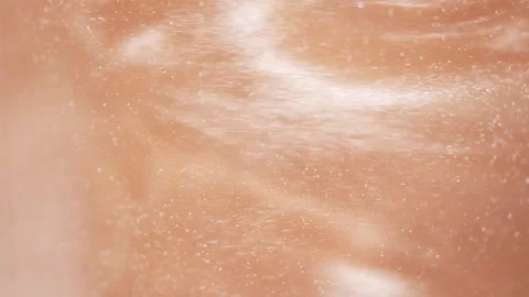Glowing particles dancing across warm canvas Stock Footage 343938506