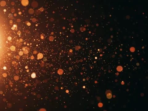 Glowing particles explode in dark space with light Stock Footage 328629529