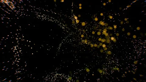 Glowing particles exploding on dark background. Background with flying lights Stock Footage 277951247