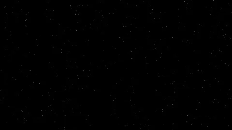 Glowing particles flashing in the dark Stockbeeldmateriaal 320884893