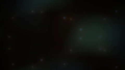 Glowing Particles Floating on Dark Background for Cinematic Visual Effects Stock Footage 344720963