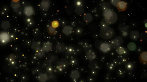 Glowing particles floating in dark space with bokeh effect Stock Footage 336591220