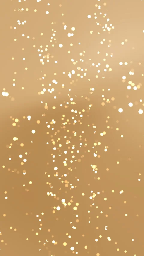 Glowing Particles Floating Gently on Warm Golden Background 스톡 동영상 333987215