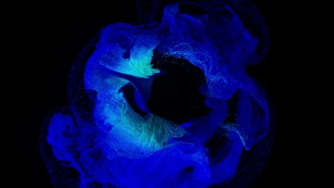 Glowing Particles in Organic Motion in Cyan and Blue Stock Footage 311554604