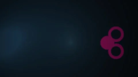 Glowing pink fidget spinner in dark background. Stock Footage 335523785