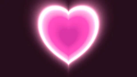 Glowing pink heart shape animation pulsing in dark digital motion footage Stock Footage 339708667