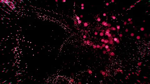 Glowing pink particles exploding and chaotically moving against black background Stock Footage 304820060
