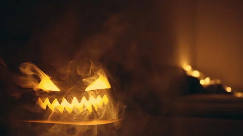 Glowing Pumpkin on Table Stock Footage 266783680