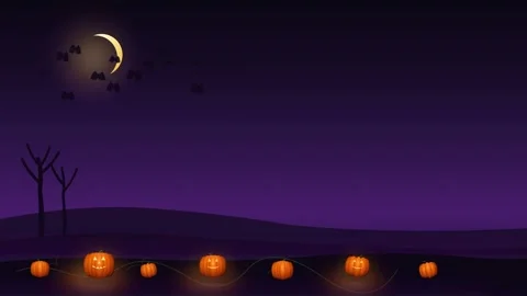 Glowing pumpkins in a dark field under a crescent moon. 4K Stock-Footage 342781764