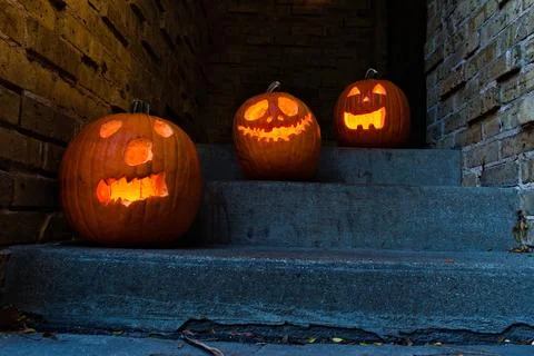 Glowing Pumpkins on Steps at Night Stock Photos
