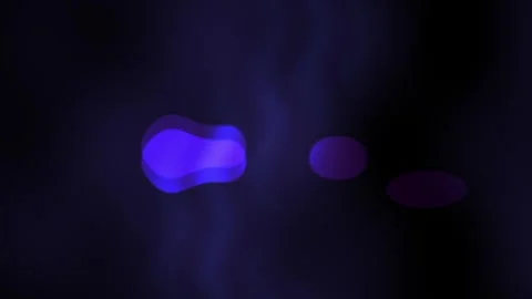 Glowing purple cells under microscope. 스톡 동영상 336700517