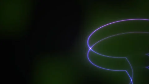 Glowing purple neon light shaped like a speech bubble against a dark green .. Stock Footage 336700851