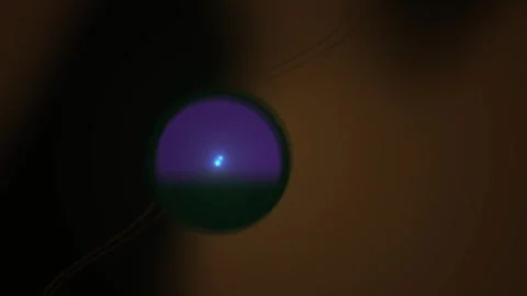 Glowing purple orb in dark room. Stock Footage 336240792