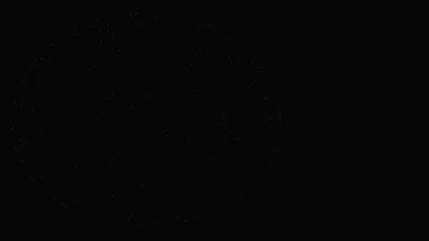 Glowing purple particle cloud disperses and reforms on dark background Stock Footage 346663645