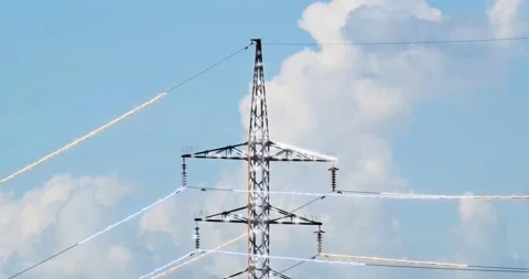 Glowing rays energy fly through the ropes of electricity pylons Clouds Timelapse Stock-Footage 169855243