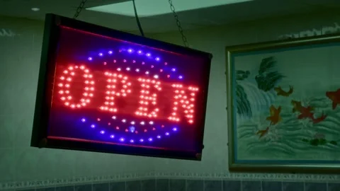 Glowing Red and Blue LED 'Open' Sign in a Chinese Restaurant Window Stock Footage 167128632