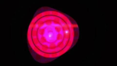 Glowing red and purple circular light effect on black background. Vidéo 335960342