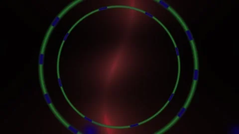 Glowing red circle with green outline and blue dots on black background. Stock Footage 336700995