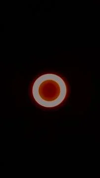 A glowing red circular light ring in a dark atmosphere, ideal for sci-fi th.. Stock Photos