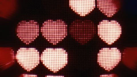 Glowing red digital led screen with heart shapes Stock Illustration