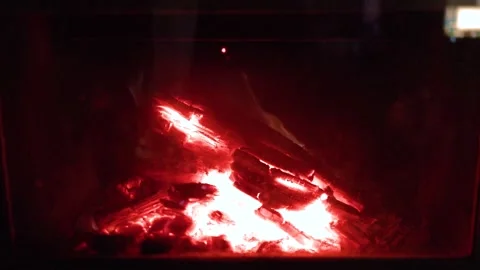 Glowing Red Embers and Fireplace Logs Burning Slowly Stock Footage 345691749