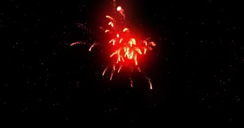 Glowing red firework exploding on black background with defocussed blue spots 스톡 일러스트