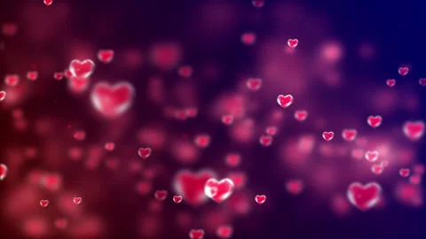 Glowing Red Heart Bubbles Floating in an Abstract Background Stock Footage 338436693