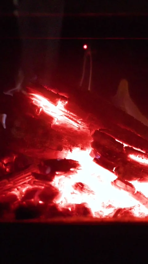 Glowing Red Hot Embers and Burning Firewood in Fireplace Stock Footage 345691747