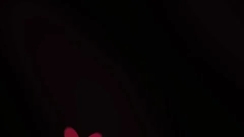 Glowing red light on a dark background. Stock Footage 337472406
