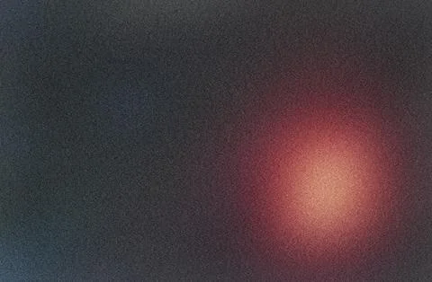 Glowing red light on dark textured background with gradient effect Stock Photos