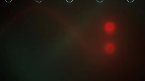 Glowing red light through wavy white lines on dark background. Stock Footage 337513866