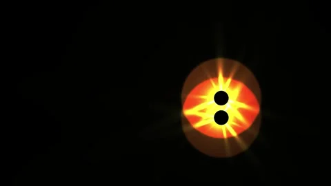 Glowing red light with yellow rays on black background. Stock Footage 336241155