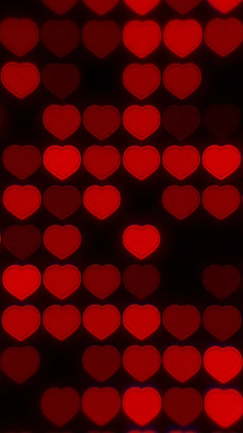 Glowing red neon hearts blinking digital grid pattern retro background Stock Footage 345811407