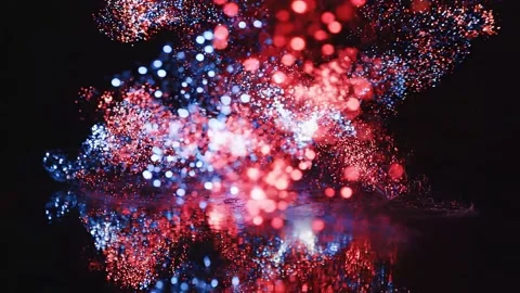 Glowing red, white, and blue droplets swirl and reflect across a dark surface Stock-Footage 337082282