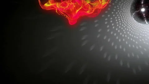 Glowing red yellow particle mesh hovering above floor while disco ball casting Stock Footage 308069189