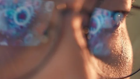 A glowing reflections of viruses or bacteria in the lenses. Stock Footage 317988262