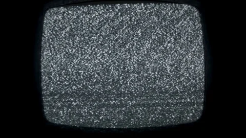 Glowing Retro TV Flickers through Static Patterns Stock Footage 104776835