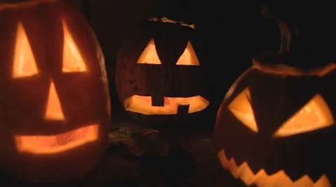 Glowing scary pumpkin at night on the steps 스톡 동영상 68201042