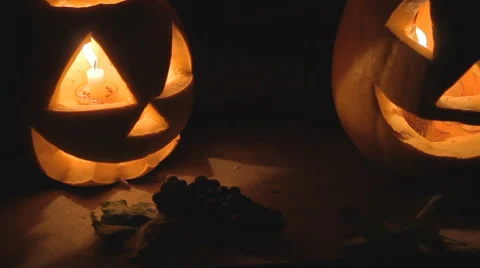 Glowing scary pumpkin at night on the steps 스톡 동영상 68201429