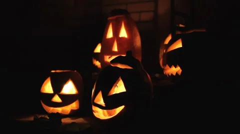 Glowing scary pumpkin at night on the steps 스톡 동영상 68201680