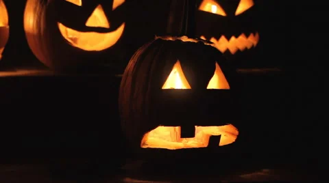 Glowing scary pumpkins at night on the steps 스톡 동영상 68202221