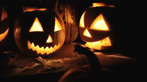 Glowing scary pumpkins at night on the steps 스톡 동영상 68203718