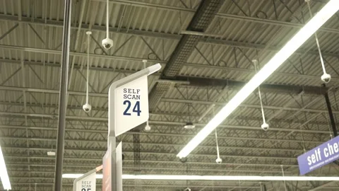 A Glowing Self Check Out Tower Light in Department Store  Stock Footage 210875580