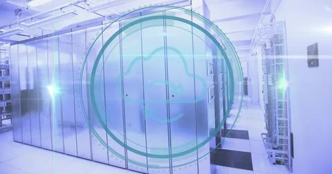 Glowing server cabinets reflecting LED glow in data center corridor, with cloud Stock Photos