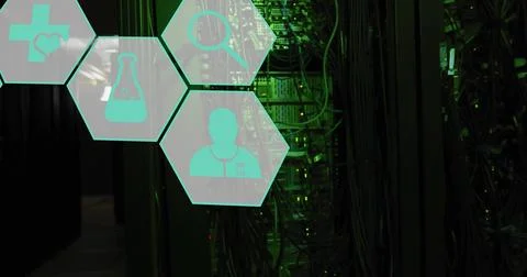 Glowing server rack and tied cables lighting narrow aisle, showing green LEDs Stock Photos