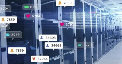 Glowing server racks displaying LEDs and cabling in data center aisle, showing Stock Photos