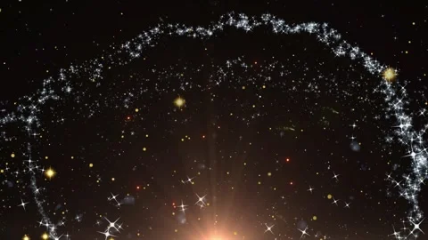 Glowing silver glitter ring on dark background with golden sparkles and light Stock Footage 345016477