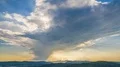 Glowing sky with clouds flying above mountains, heavenly sunrise, timelapse 4k or 4k+ Resolution