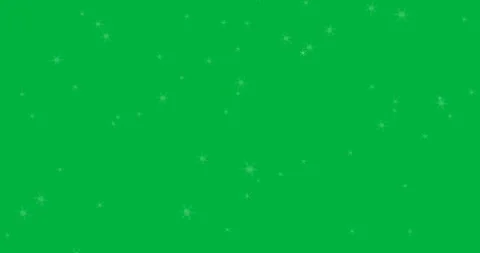 Glowing snow particles falling against black background Stock Footage 347308041